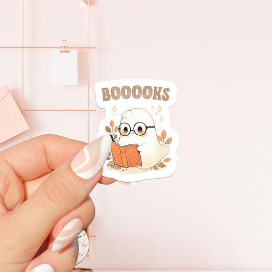 Books ghost holding orange book Sticker